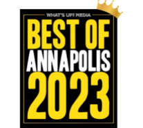 Image of a "Best of Annapolis 2023" award from What's Up? Media, featuring bold yellow and white text on a black background with a gold crown graphic in the corner.